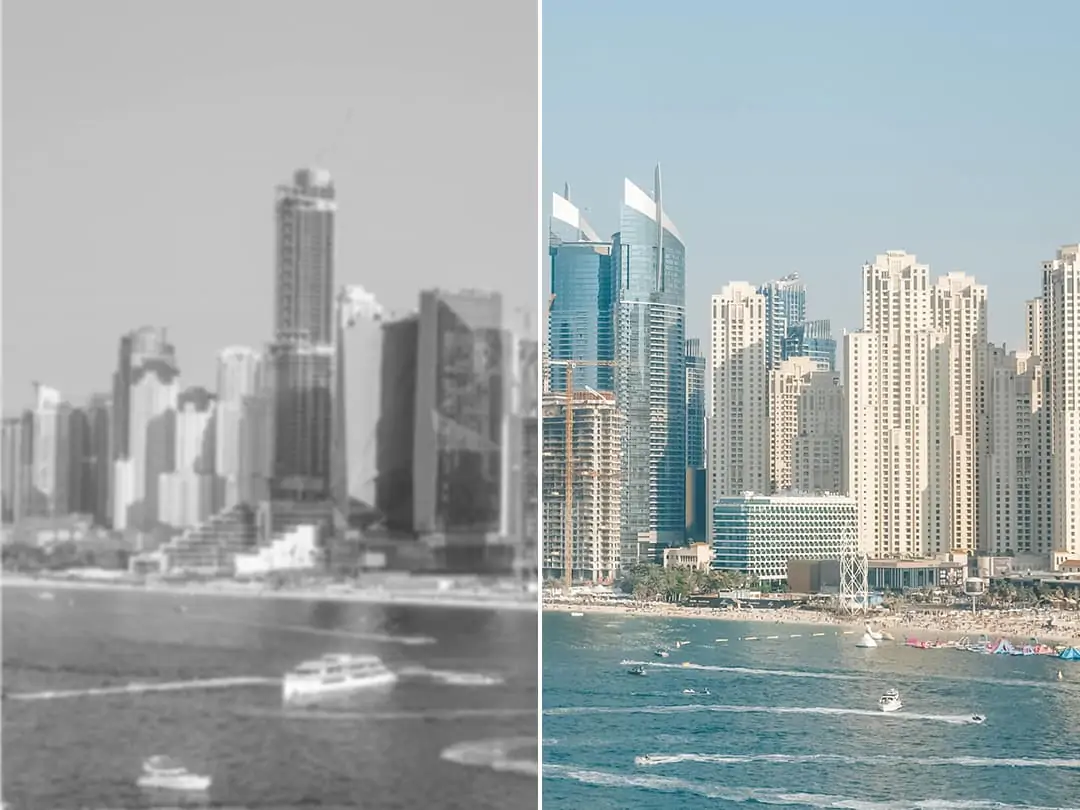 A black and white landscape photo is colorized with AI, showing vivid sky, green grass, and blurred background for a natural, vibrant look.